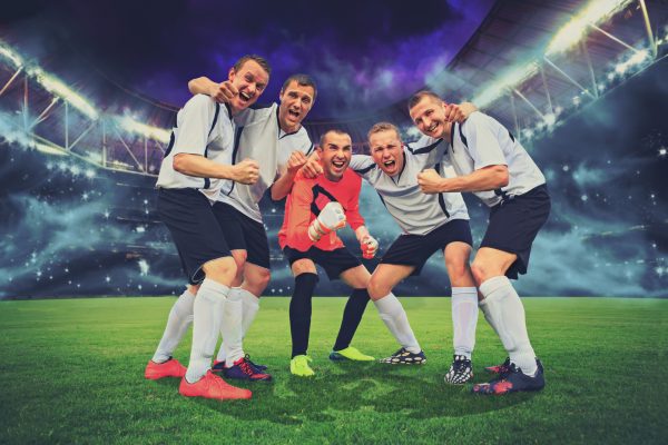 scenes from a soccer or football game with cheering male player